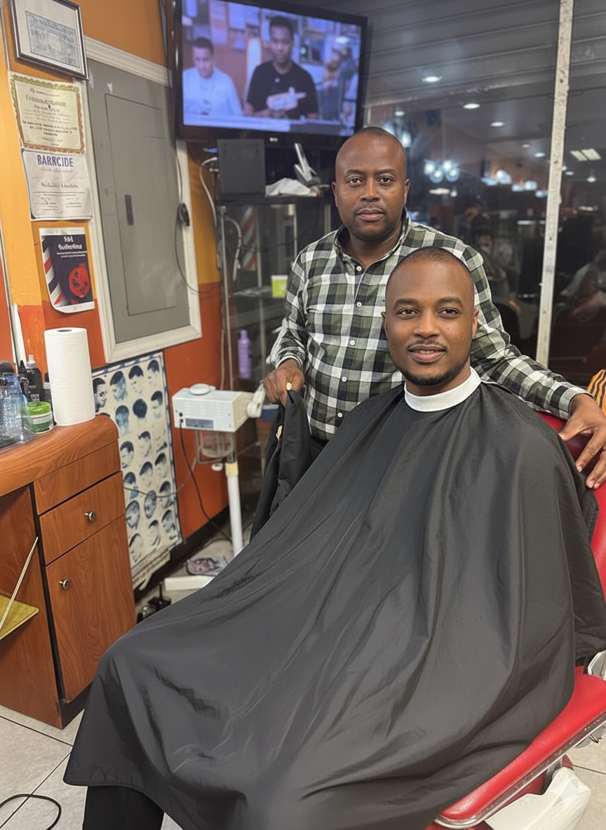 Haitian master barber at work in L & L Barbershop, Flatbush, Brooklyn